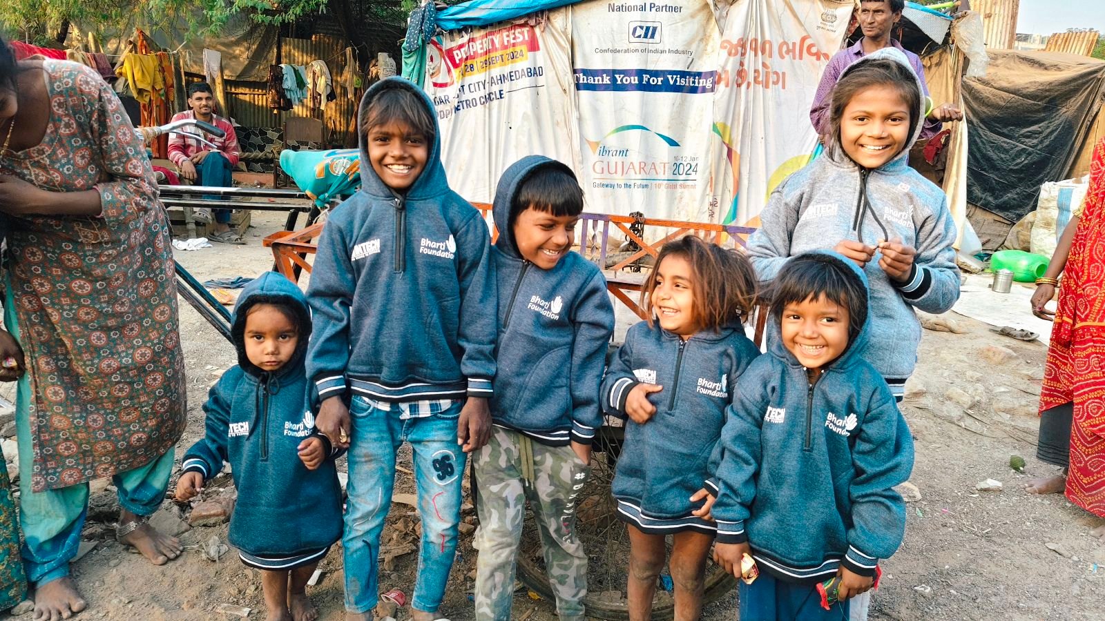 Smiling schoolchildren with their school bags